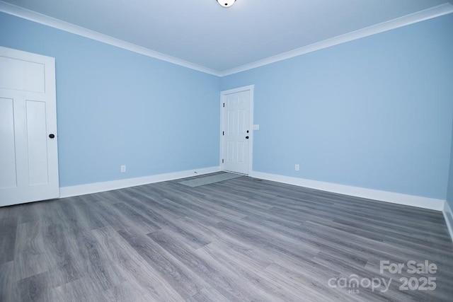 305 E Henry St, Belmont, NC 28012 - unfurnished room with crown molding and wood finished floors