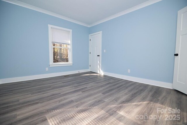 305 E Henry St, Belmont, NC 28012 - spare room with dark wood-style floors and ornamental molding