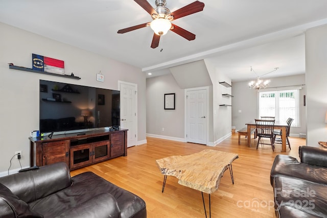 206 Taylor Cir, Granite Falls, NC 28630 - living area featuring a ceiling fan, a chandelier, and light wood-style floors