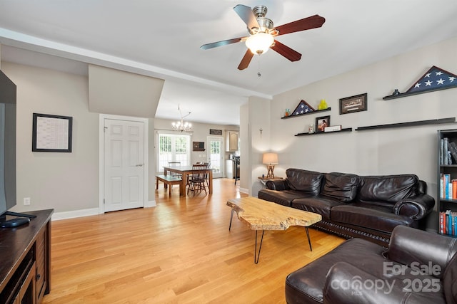 206 Taylor Cir, Granite Falls, NC 28630 - living room with light wood-type flooring, a chandelier, and a ceiling fan
