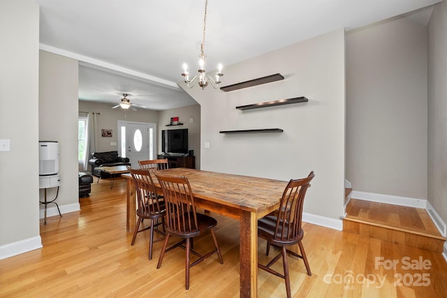 206 Taylor Cir, Granite Falls, NC 28630 - dining room with a chandelier, light wood-style flooring, and ceiling fan