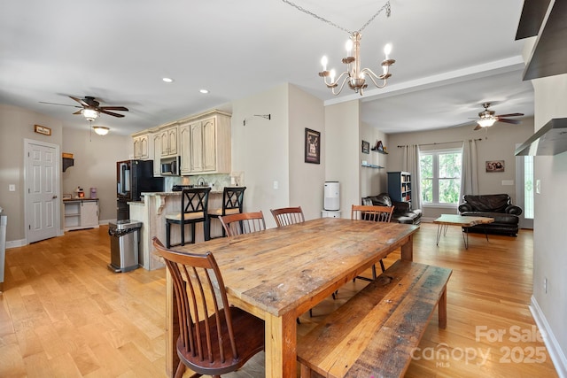 206 Taylor Cir, Granite Falls, NC 28630 - dining space with ceiling fan, light wood-style flooring, a chandelier, and recessed lighting