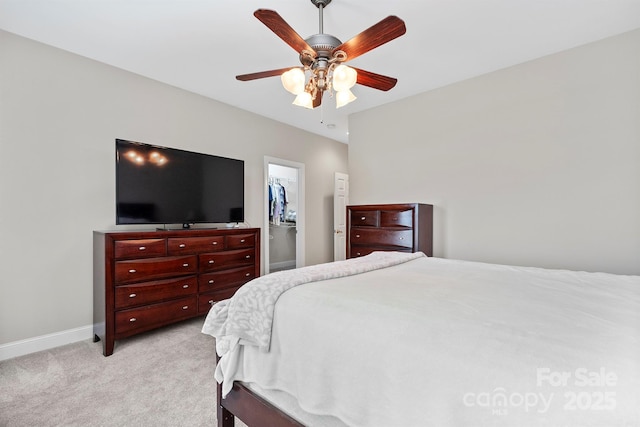 206 Taylor Cir, Granite Falls, NC 28630 - bedroom featuring light colored carpet, a walk in closet, ceiling fan, and a closet