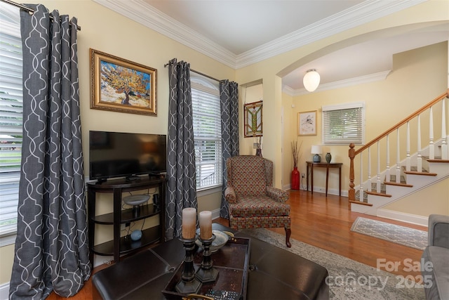 115 White Ash Dr Unit E, Asheville, NC 28801 - living area with arched walkways, wood finished floors, crown molding, and stairs