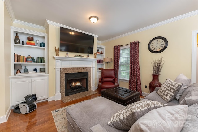 115 White Ash Dr Unit E, Asheville, NC 28801 - living room with ornamental molding, wood finished floors, and a warm lit fireplace
