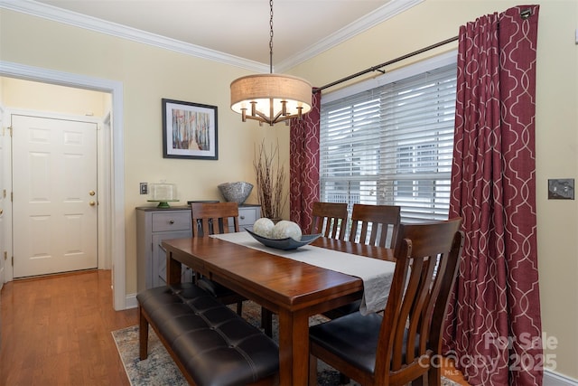 115 White Ash Dr Unit E, Asheville, NC 28801 - dining room with crown molding, wood finished floors, and a chandelier