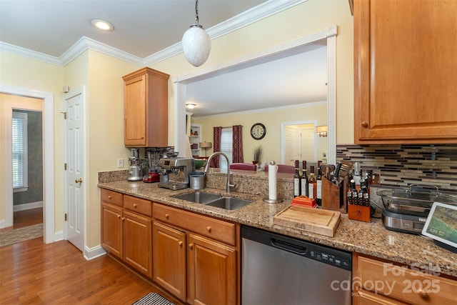 115 White Ash Dr Unit E, Asheville, NC 28801 - kitchen featuring stainless steel dishwasher, tasteful backsplash, ornamental molding, wood finished floors, and light stone counters