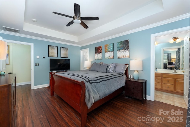 115 White Ash Dr Unit E, Asheville, NC 28801 - bedroom with a tray ceiling, wood finished floors, crown molding, ceiling fan, and connected bathroom
