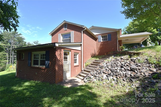 141 Azalea Dr, Connelly Springs, NC 28612 - view of side of home featuring stairs, brick siding, and a yard