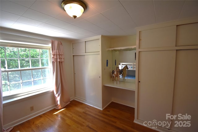 141 Azalea Dr, Connelly Springs, NC 28612 - unfurnished bedroom featuring light wood-style floors and baseboards