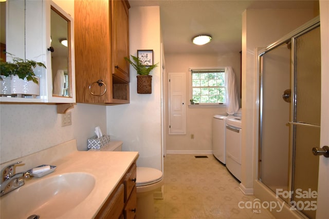 141 Azalea Dr, Connelly Springs, NC 28612 - full bathroom with washer and clothes dryer, tile patterned floors, an enclosed shower, and vanity