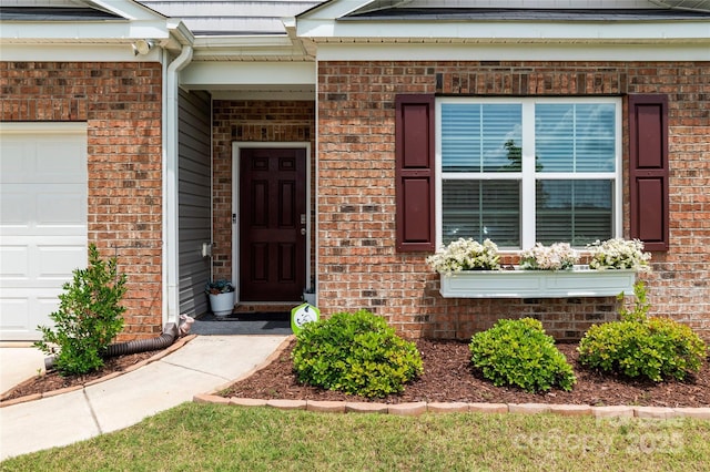 192 Culloden Dr, Mocksville, NC 27028 - view of exterior entry featuring brick siding and an attached garage