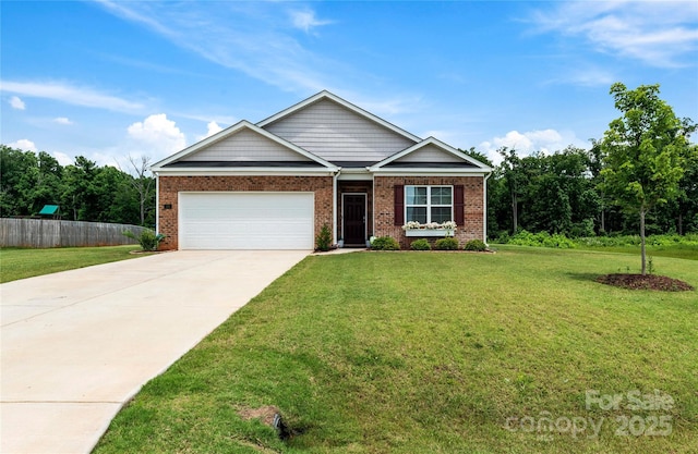 192 Culloden Dr, Mocksville, NC 27028 - view of front facade featuring driveway, a garage, and brick siding