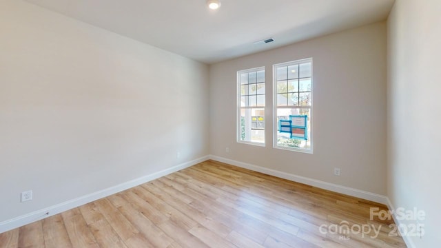 608 Banter Ln Unit 31, Cramerton, NC 28032 - empty room featuring baseboards and light wood-style flooring