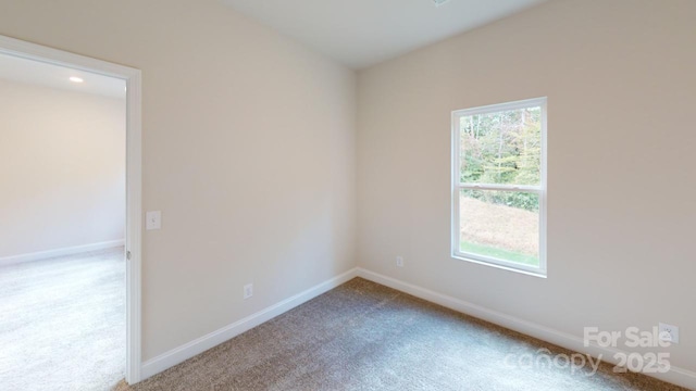 608 Banter Ln Unit 31, Cramerton, NC 28032 - carpeted empty room featuring baseboards