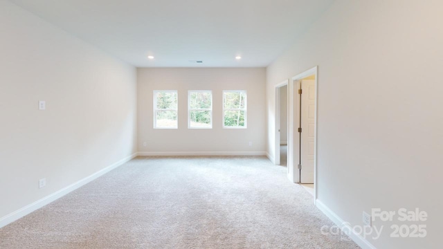 608 Banter Ln Unit 31, Cramerton, NC 28032 - spare room featuring light carpet and recessed lighting