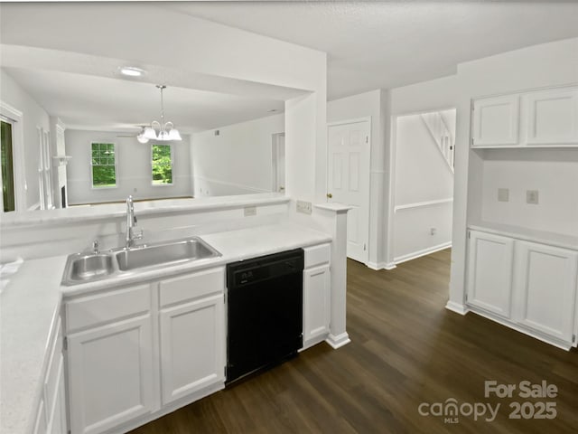 424 Mallard Dr, Pineville, NC 28134 - kitchen featuring black dishwasher, dark wood-style flooring, a chandelier, and white cabinets