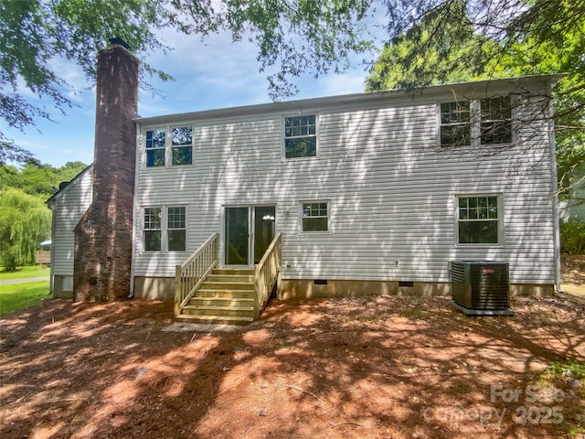 424 Mallard Dr, Pineville, NC 28134 - back of property with a chimney, crawl space, and entry steps