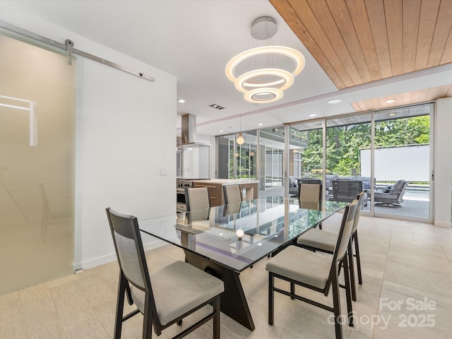 3306 Nancy Creek Rd, Charlotte, NC 28270 - dining area featuring expansive windows, a chandelier, and a barn door