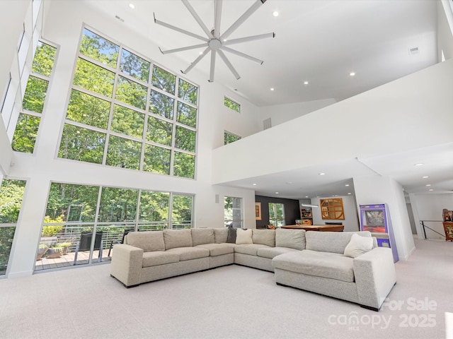 3306 Nancy Creek Rd, Charlotte, NC 28270 - carpeted living room featuring a high ceiling, recessed lighting, and ceiling fan