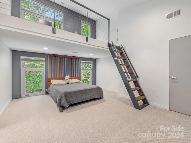 3306 Nancy Creek Rd, Charlotte, NC 28270 - carpeted bedroom featuring a towering ceiling and multiple windows