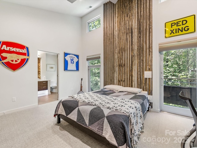 3306 Nancy Creek Rd, Charlotte, NC 28270 - carpeted bedroom with a towering ceiling, access to exterior, and connected bathroom