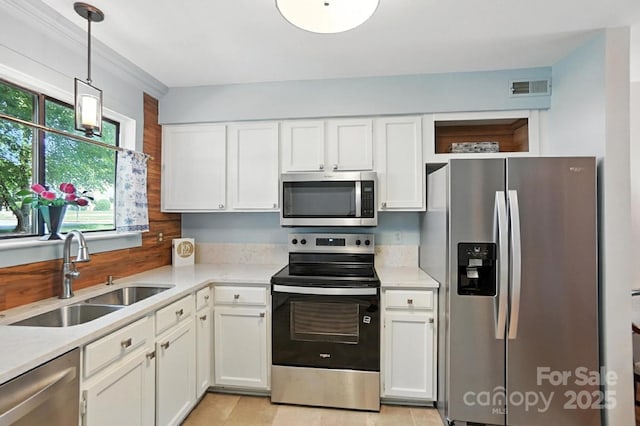 3020 Heathstead Pl Unit A, Charlotte, NC 28210 - kitchen with appliances with stainless steel finishes, white cabinetry, and light countertops