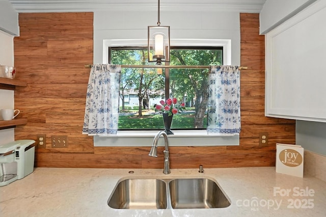 3020 Heathstead Pl Unit A, Charlotte, NC 28210 - kitchen featuring crown molding, light stone counters, and pendant lighting