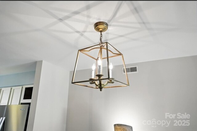 3020 Heathstead Pl Unit A, Charlotte, NC 28210 - detailed view of freestanding refrigerator and a chandelier