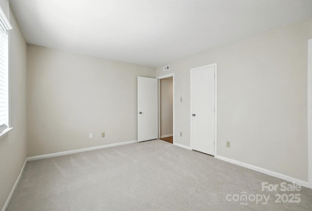 3020 Heathstead Pl Unit A, Charlotte, NC 28210 - unfurnished room with light colored carpet and baseboards