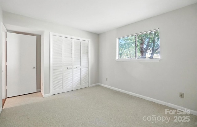 3020 Heathstead Pl Unit A, Charlotte, NC 28210 - unfurnished bedroom with carpet and a closet