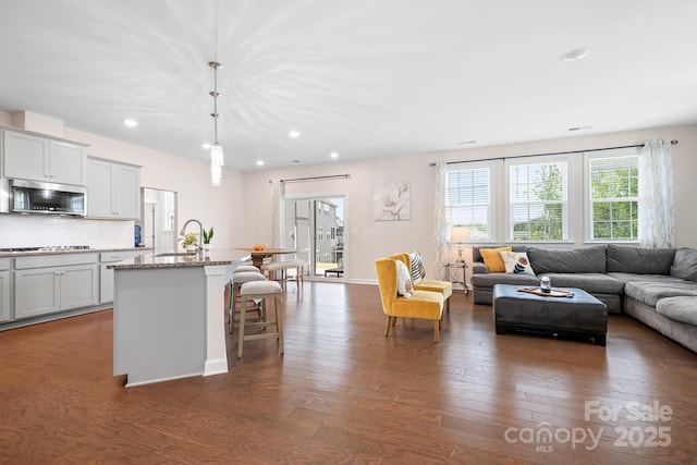 4116 Tory Path Rd, Waxhaw, NC 28173 - living room with dark wood-style floors and recessed lighting