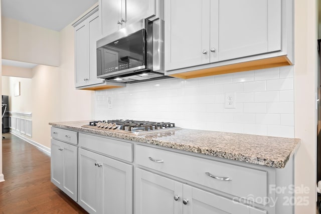 4116 Tory Path Rd, Waxhaw, NC 28173 - kitchen with appliances with stainless steel finishes, dark wood-style flooring, tasteful backsplash, and light stone countertops