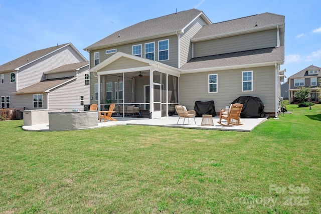 4116 Tory Path Rd, Waxhaw, NC 28173 - rear view of house with a sunroom, a patio, a lawn, a ceiling fan, and roof with shingles