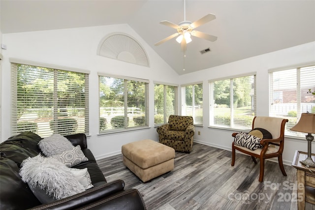6811 Ledgestone Pl, Charlotte, NC 28227 - sunroom / solarium featuring wood finished floors and high vaulted ceiling