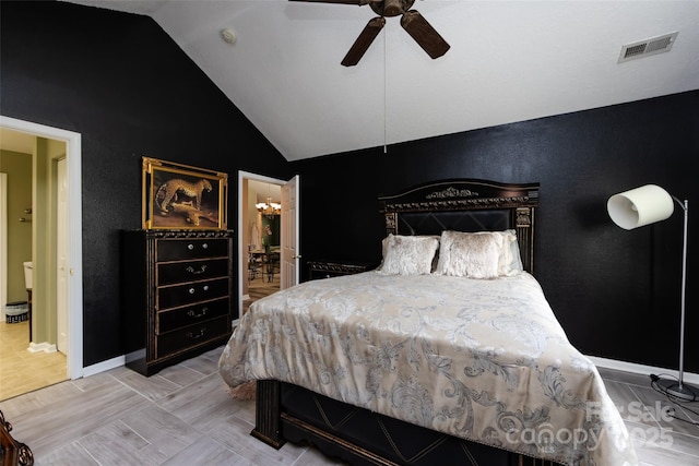 6811 Ledgestone Pl, Charlotte, NC 28227 - bedroom featuring lofted ceiling, connected bathroom, a chandelier, and ceiling fan