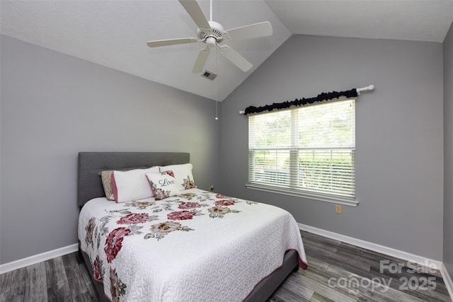 6811 Ledgestone Pl, Charlotte, NC 28227 - bedroom with lofted ceiling, wood finished floors, and ceiling fan