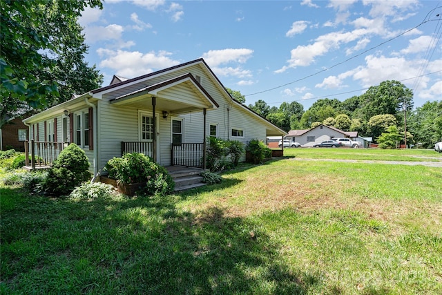 3425 Long Ferry Rd, Salisbury, NC 28146 - view of property exterior with covered porch and a lawn