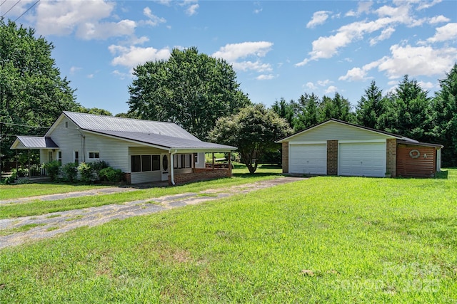 3425 Long Ferry Rd, Salisbury, NC 28146 - view of green lawn featuring a garage and an outdoor structure