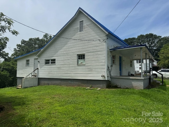 127 Hill St, Mooresboro, NC 28114 - view of side of property with a lawn and covered porch
