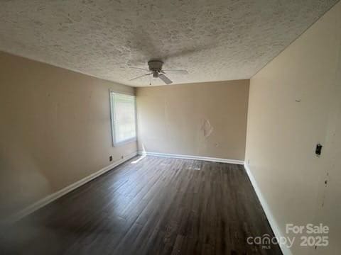 127 Hill St, Mooresboro, NC 28114 - empty room featuring ceiling fan, wood finished floors, and a textured ceiling