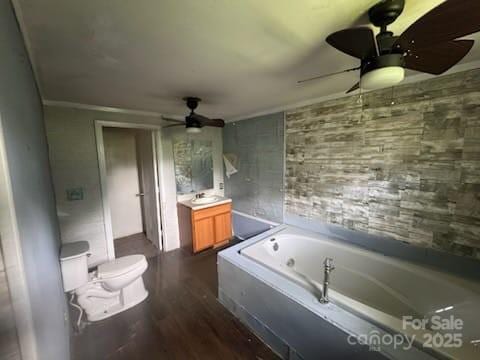 127 Hill St, Mooresboro, NC 28114 - full bath with ceiling fan, a whirlpool tub, vanity, and wood finished floors