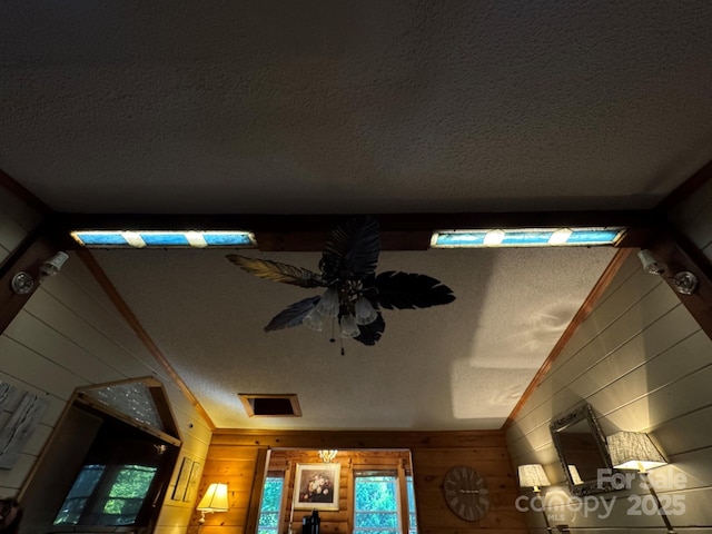 19 Timbers Edge Ln Unit 23, Fairview, NC 28730 - detailed view of wooden walls, a textured ceiling, and a ceiling fan