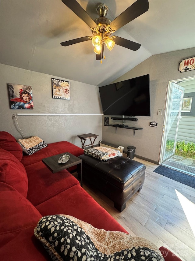 19 Timbers Edge Ln Unit 23, Fairview, NC 28730 - living area with vaulted ceiling, wood finished floors, a ceiling fan, and a textured wall