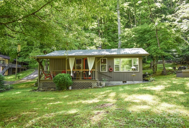 3435 Conleys Creek Rd, Whittier, NC 28789 - view of front facade featuring covered porch, a front yard, a metal roof, and crawl space