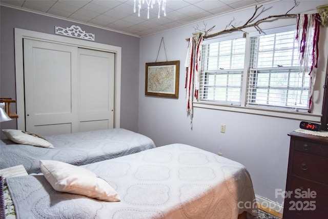 3435 Conleys Creek Rd, Whittier, NC 28789 - bedroom featuring a closet and crown molding