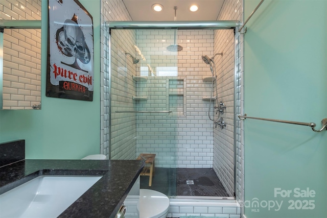 84 W St, Weaverville, NC 28787 - bathroom featuring vanity, a stall shower, and recessed lighting