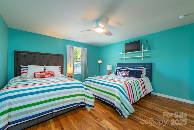 84 W St, Weaverville, NC 28787 - bedroom featuring wood finished floors and a ceiling fan