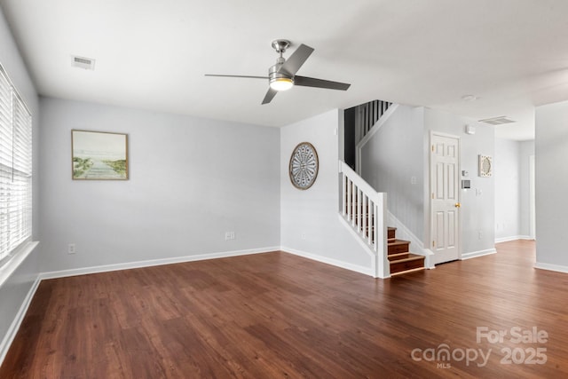 11023 Kinston Ridge Pl, Charlotte, NC 28273 - empty room with stairs, wood finished floors, and a ceiling fan