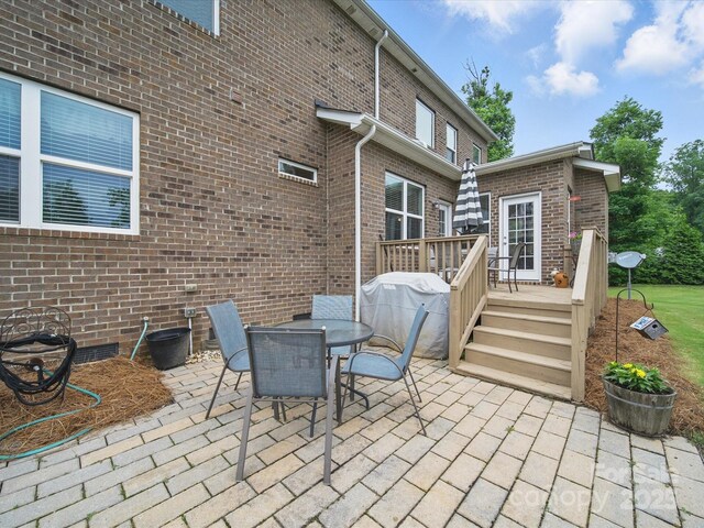 9450 Surface Hill Rd, Mint Hill, NC 28227 - view of patio featuring a deck, grilling area, and outdoor dining space
